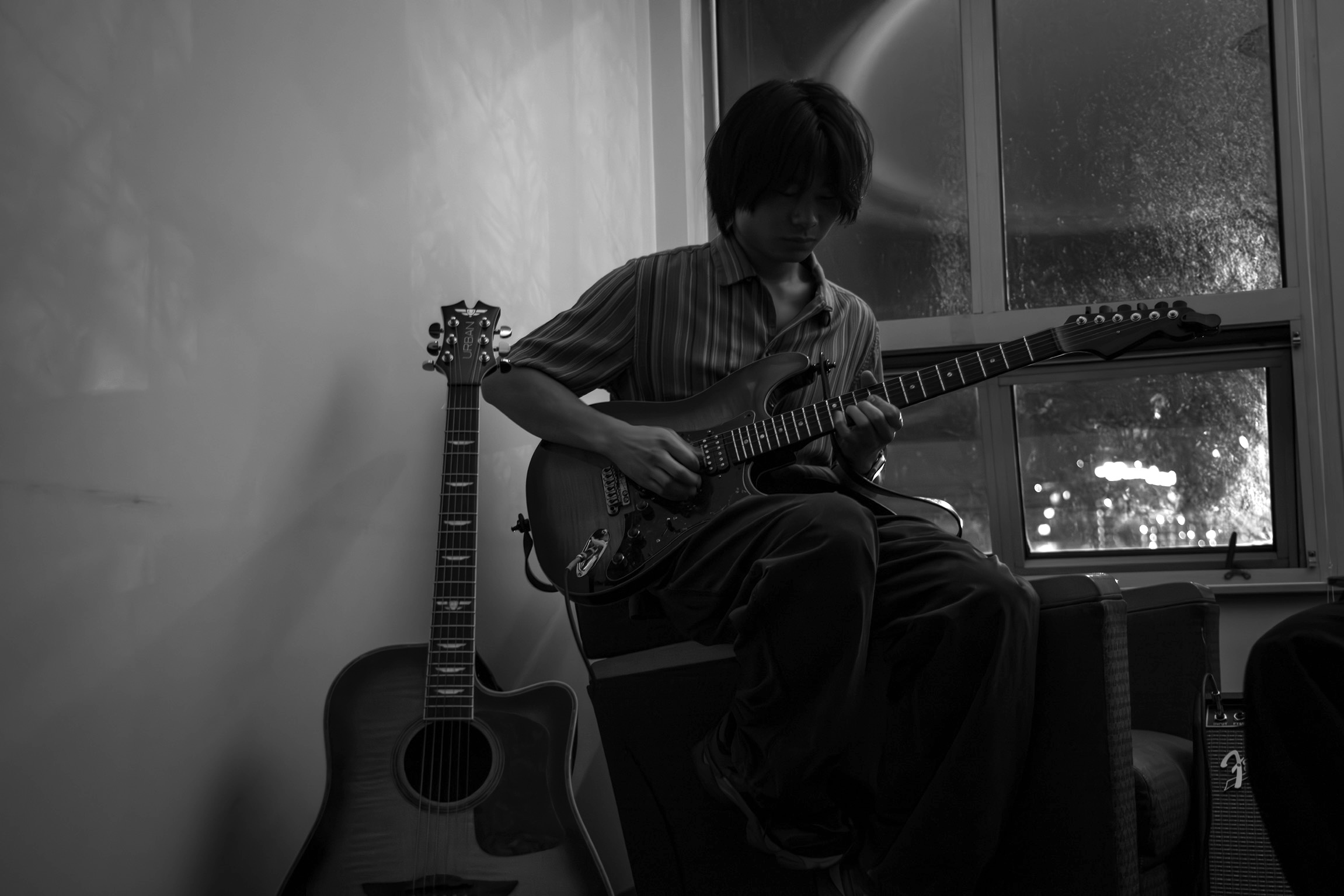 Ollie playing guitar